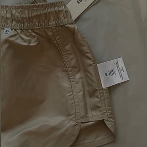 Fear of God Essentials Women's Nylon Running Shorts in Oak